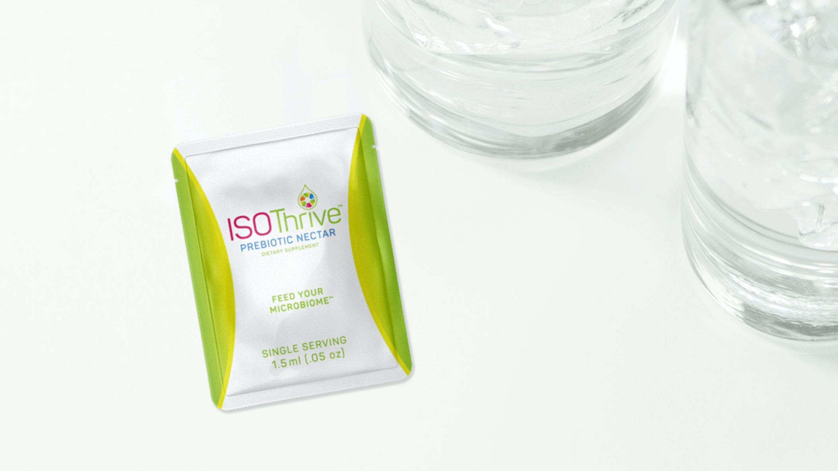 Iso Thrive packet with water glass